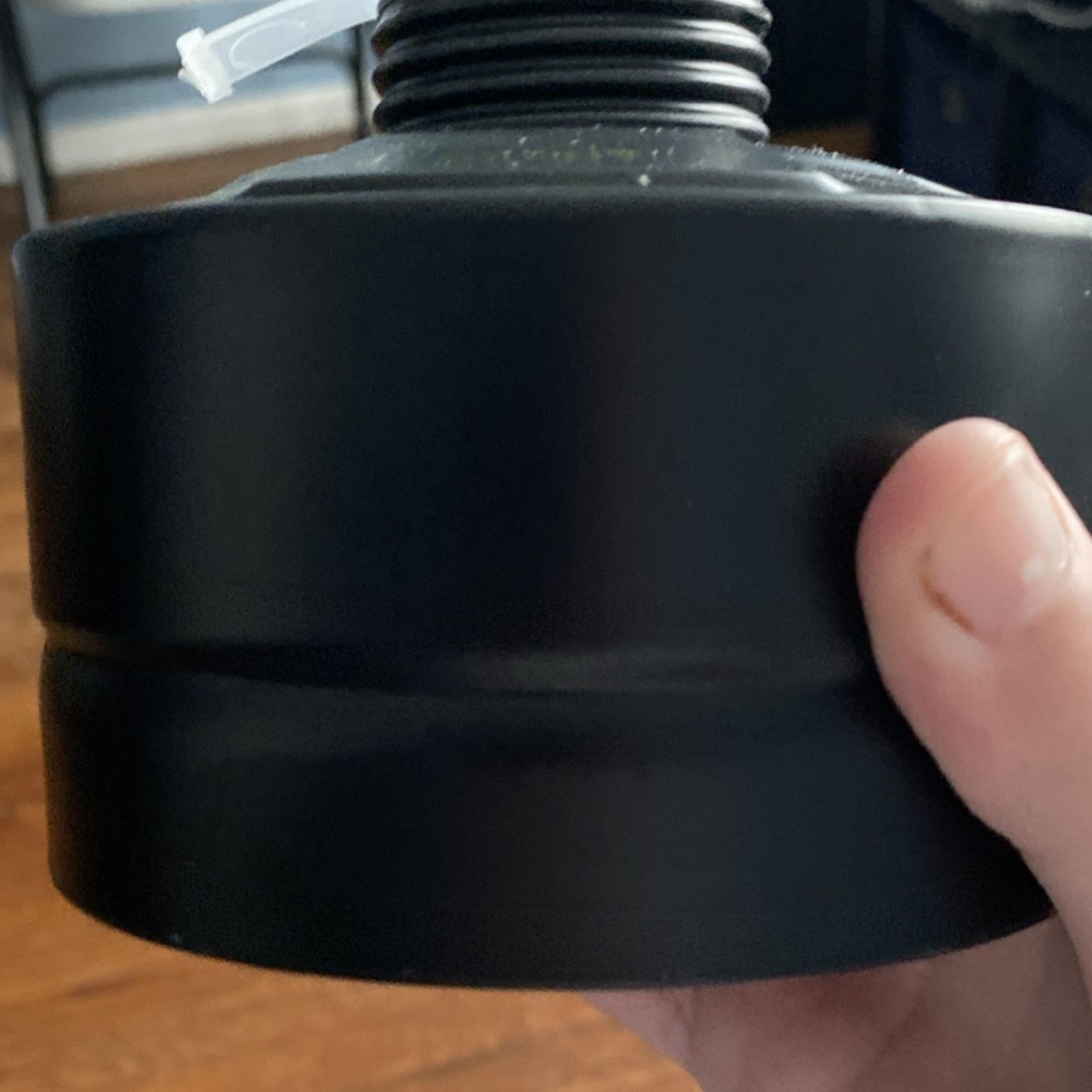 “Dräger 7000* gas mask with sealed black filter