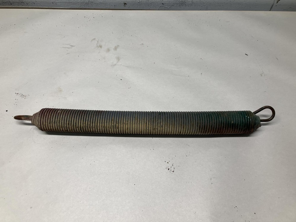 Peterbilt 386 Hood Spring - Used | P/N NA