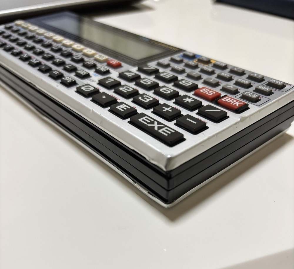 CASIO VX-4 mini Pocket Personal Computer Calculator Tested AA Battery Replaced.