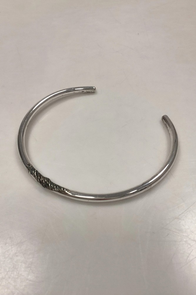 Modern Open Neck Ring in unmarked silver