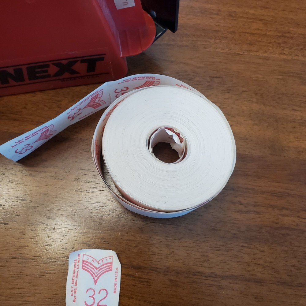 U R NEXT Ticket No. Dispenser with 1 partial Roll