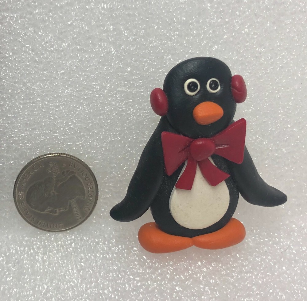 Penguin Wearing Red Bowtie & Earmuffs Plastic Pin