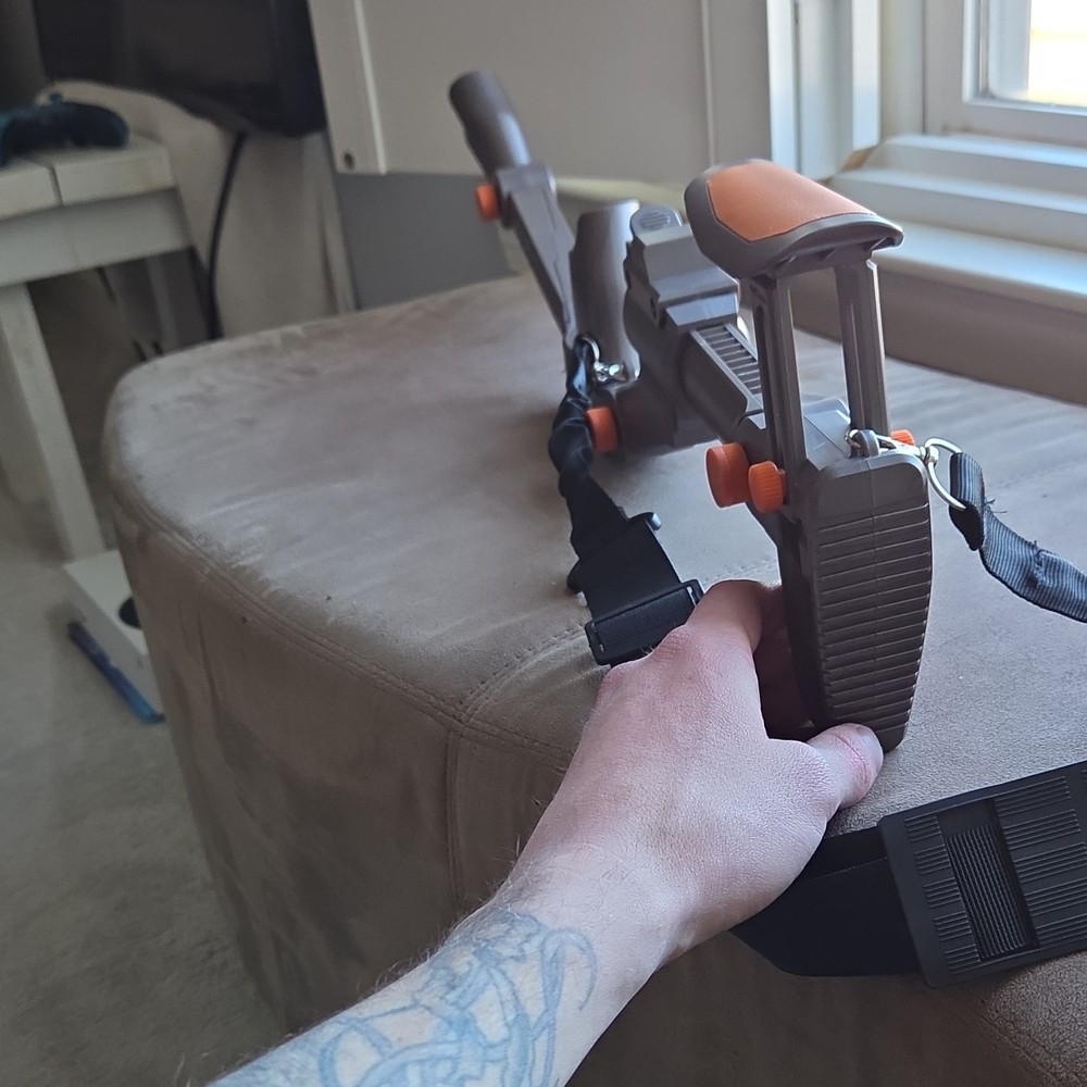 Gray and Orange Controller Gun Stock Accessory for VR Controller