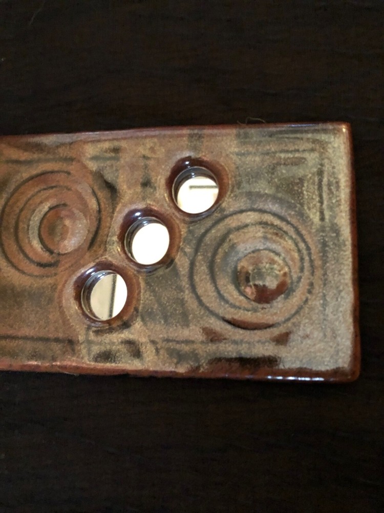 Mirror. Brown Ceramic Circa 2012.