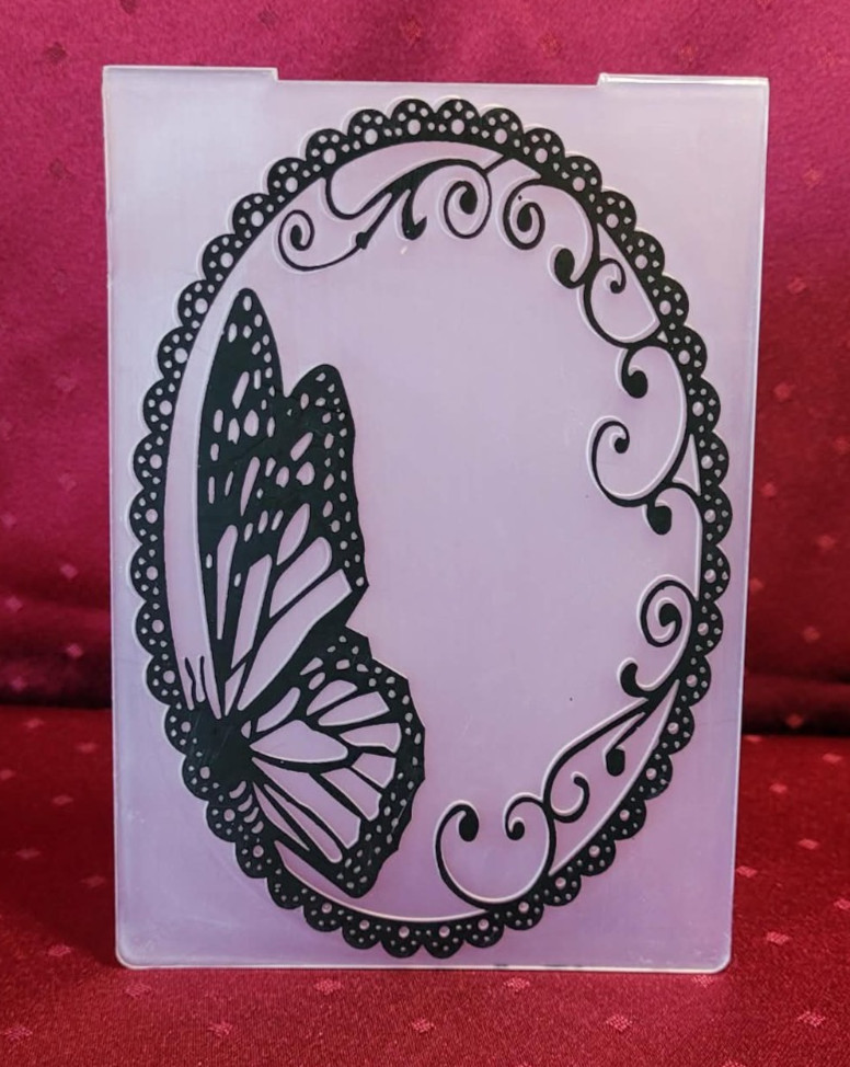 Butterfly in oval embossing folder- Generic
