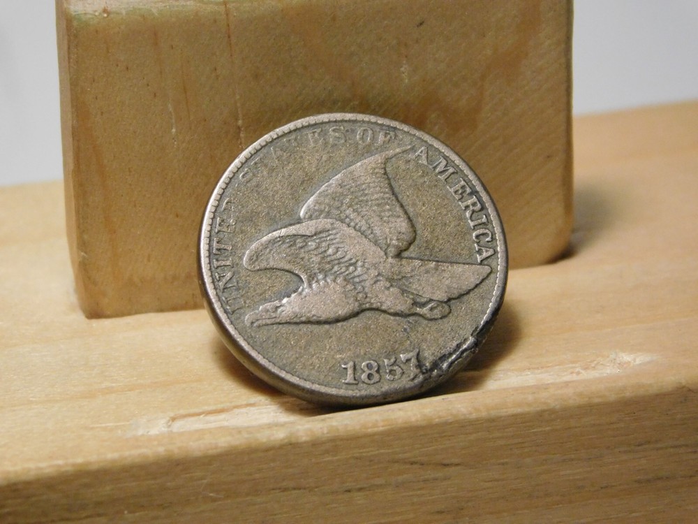 1857 U.S. Flying Eagle cent, lamination error at edge