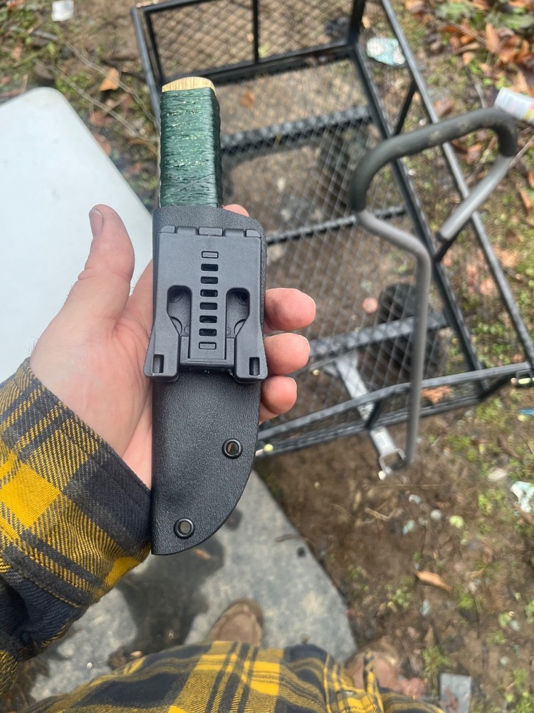 puukko sized training knife with tek lok for combatives practice