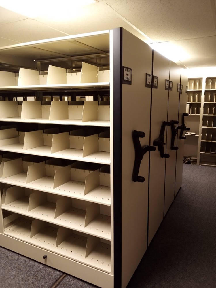 Spacesaver brand rolling office shelves