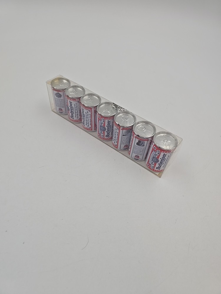 7 Miniture Budweiser cans