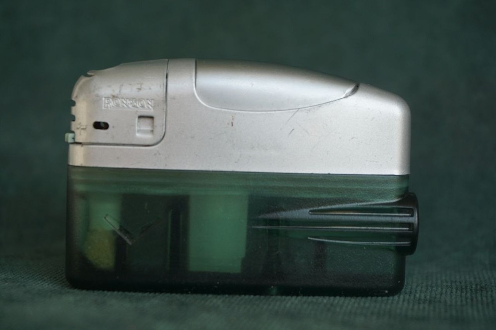 Vintage CAINES by Ronson Pocket Lighter