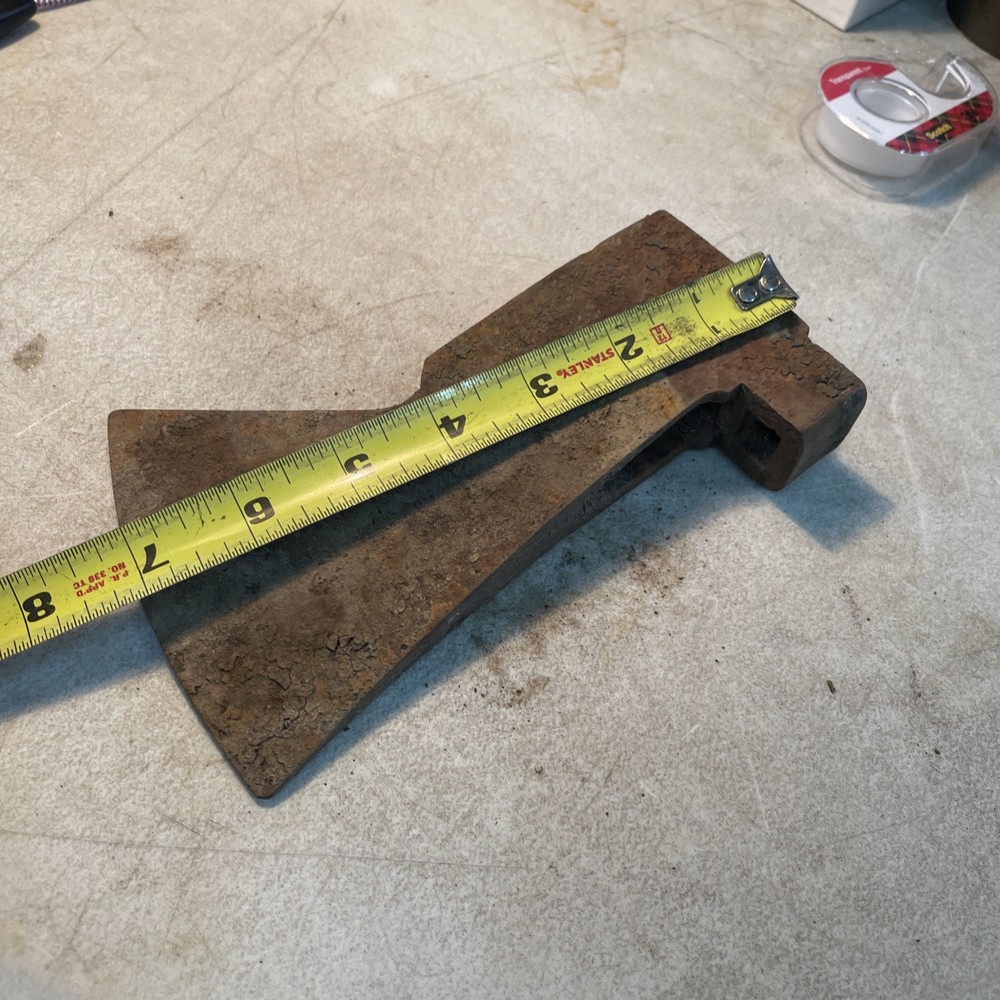 Vintage axhead with tool holder