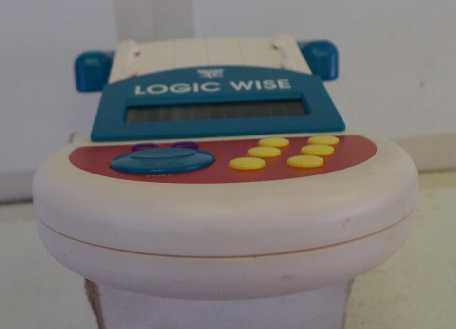 Electronic Handheld Game - 1995 Tiger ED Logic Wise Education Game - TESTED