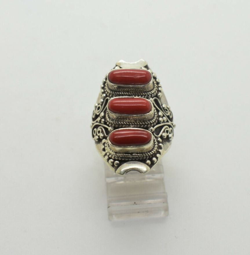 This is Sterling Silver Ring with Coral . adjustable fit