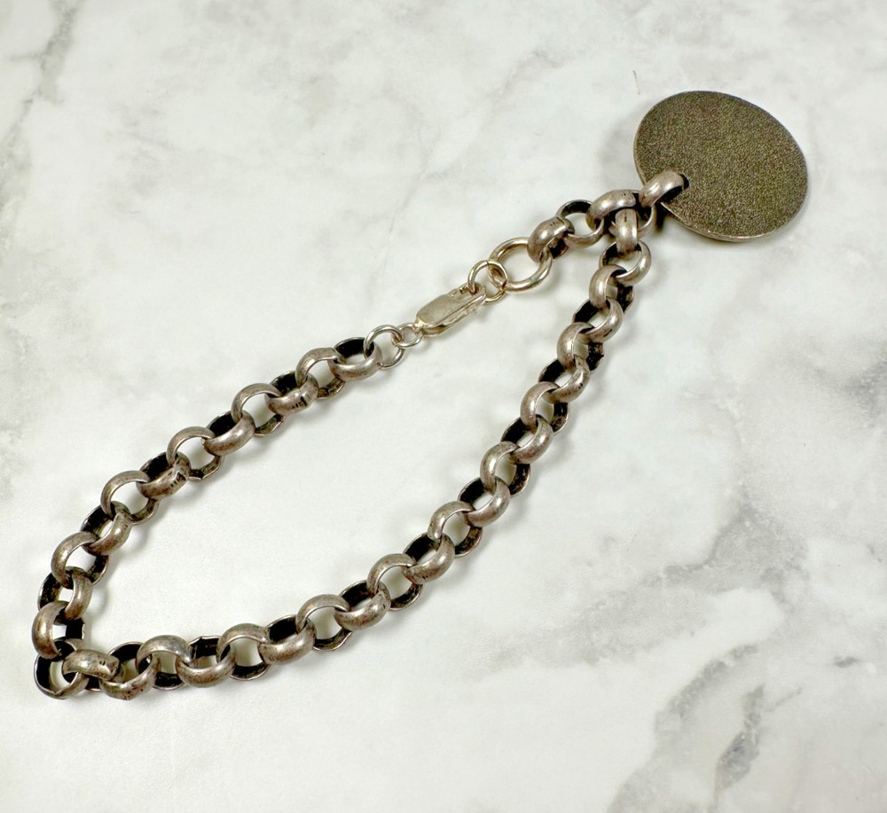 Simplify 7526 Charm on a Silver Tone Big Link Bracelet - 8"