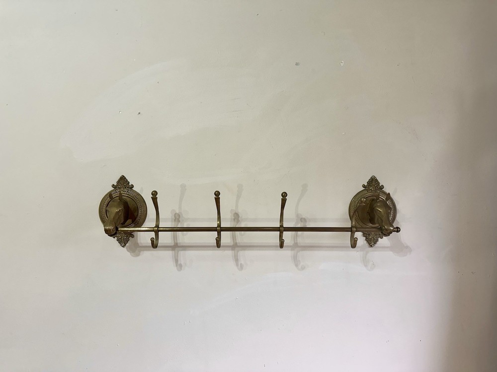 Mid century brass coat rail.