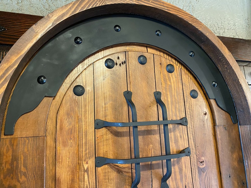 Rustic reclaimed solid old growth lumber Doug Fir wine room solid speakeasy cage