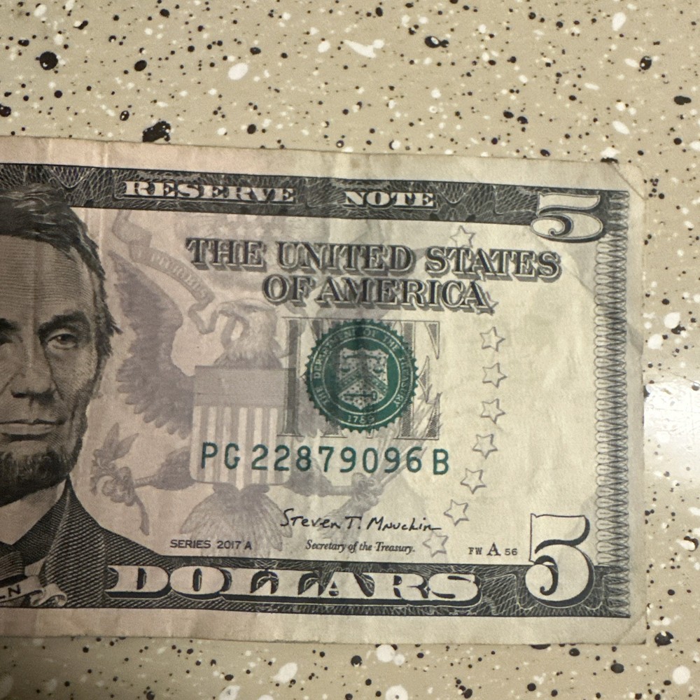 Misaligned, miscut $5 bill RARE