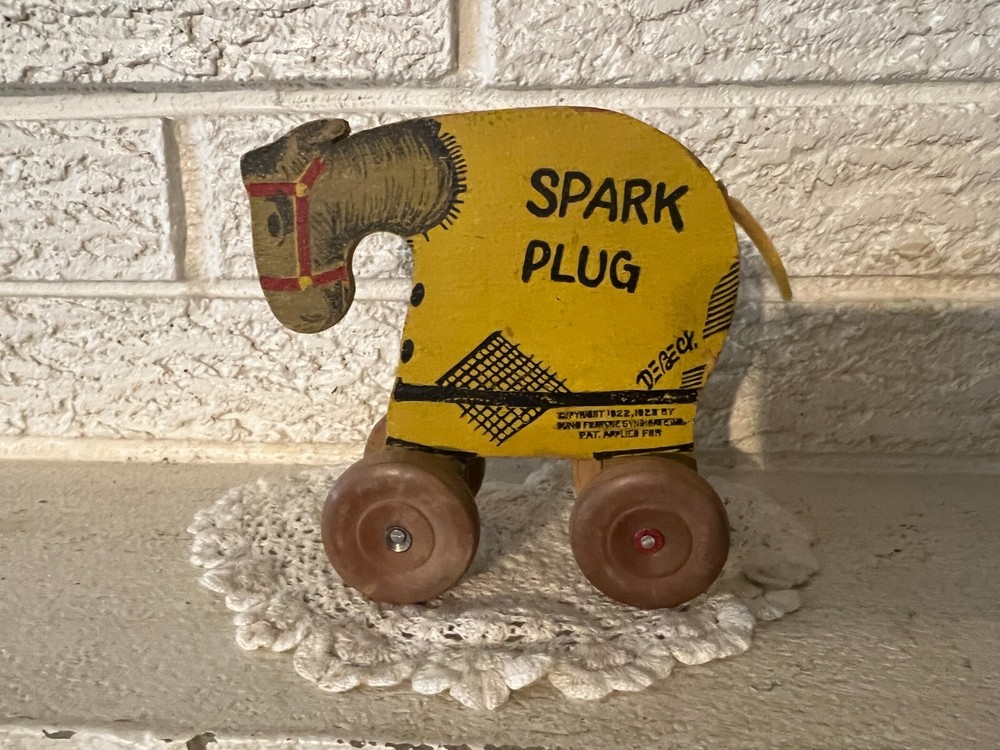 Debeck Spark Plug Platform toy