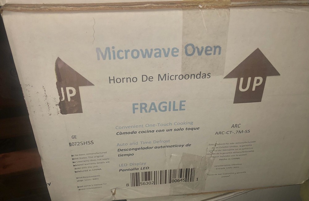 GE 700 Watt, 7cu Microwave- White