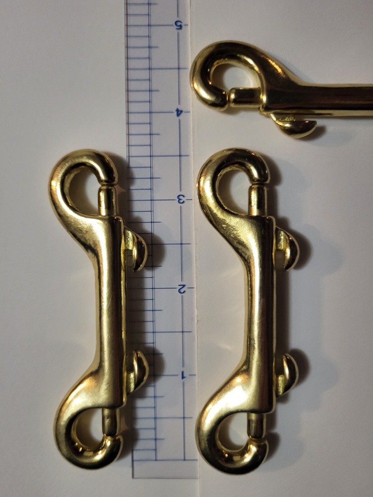 3 1/2" solid brass double sided snap hook. thumb release. leash lanyard