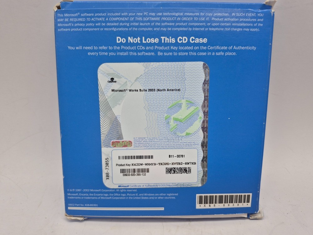 Microsoft works suite 2003-5 discs-pre owned