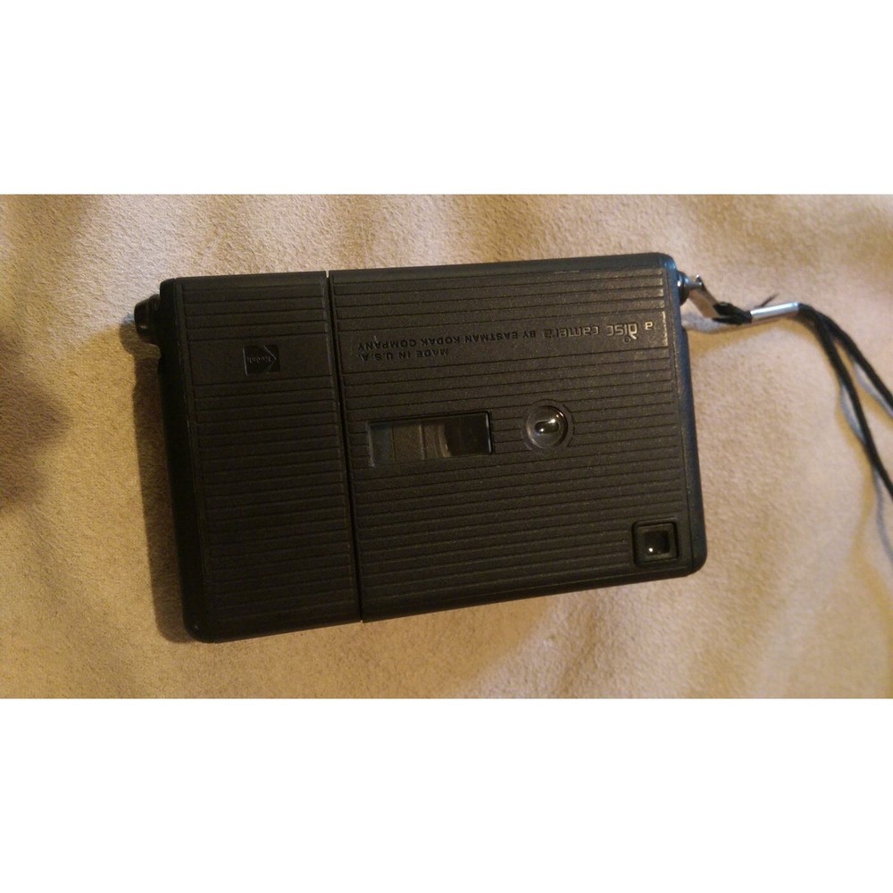 Camera Bundle - Kodak Disk 4100 Camera, Rokinon 35mm, Polaroid Flashgun #268