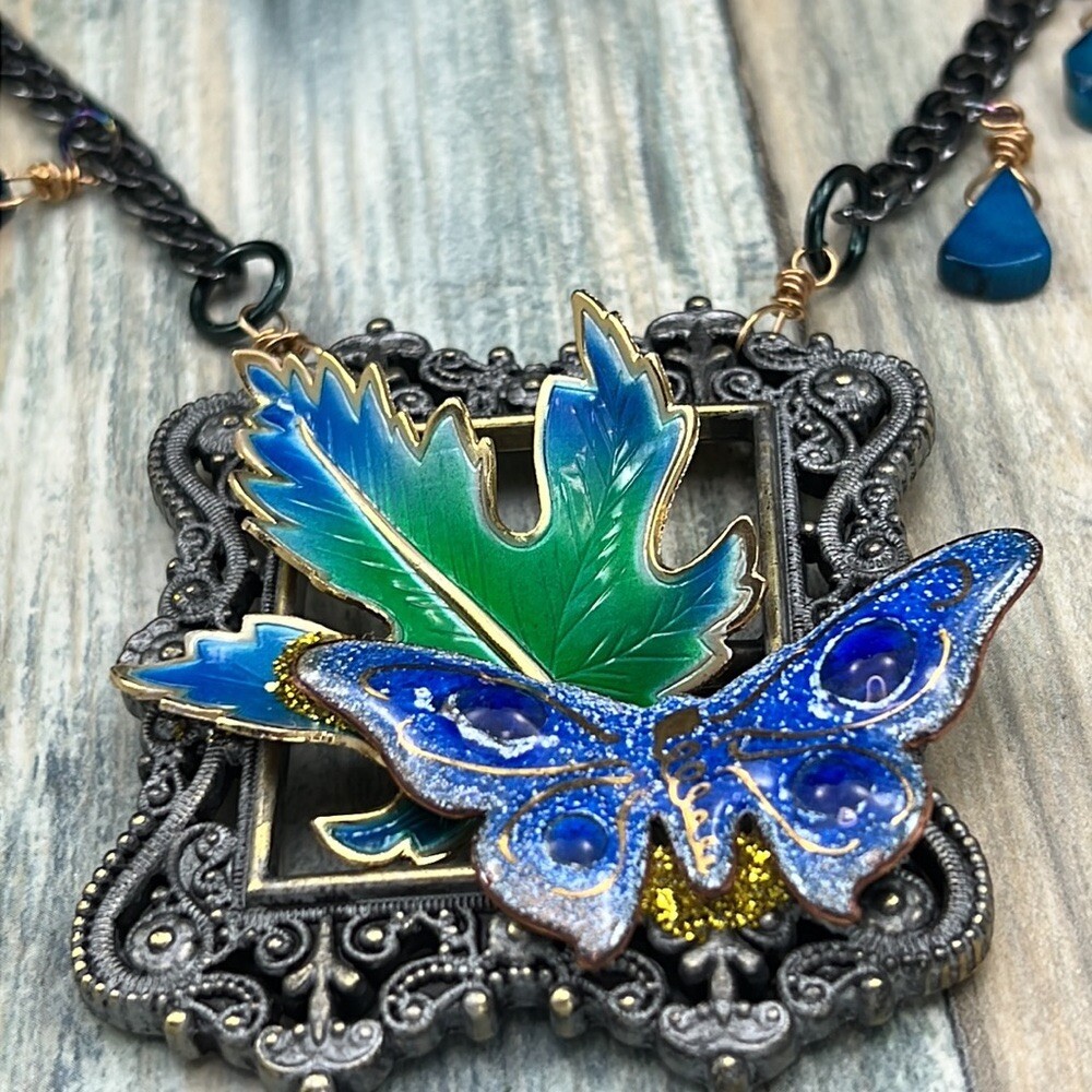 Adorned Crown Artisan Assemblage enamel blue framed butterfly leaf necklace