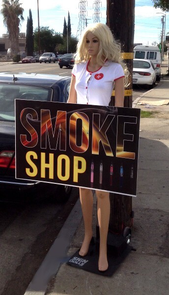 Sign Waving Mannequin by SignDolls