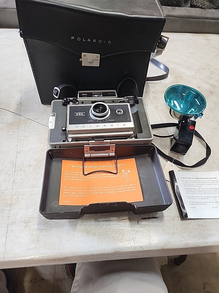 Polaroid 330 Land Camera Flash, Bulbs,   And Leather Case! UnTested
