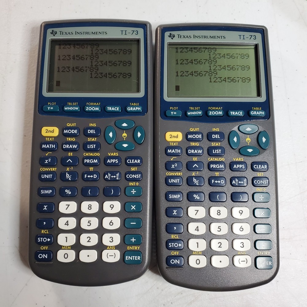 Two Texas Instruments TI-73 Graphing Calculators Used - WORK