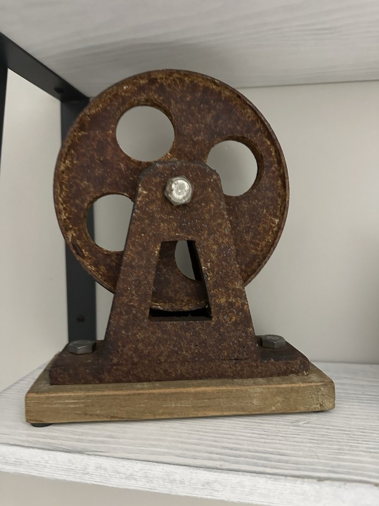 metal wheal on Wooden Base