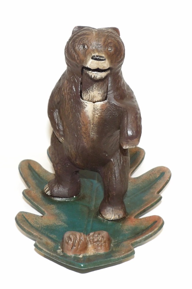 WONDERFUL M.I. CAST IRON BEAR STANDING ON LEAF NUTCRACKER