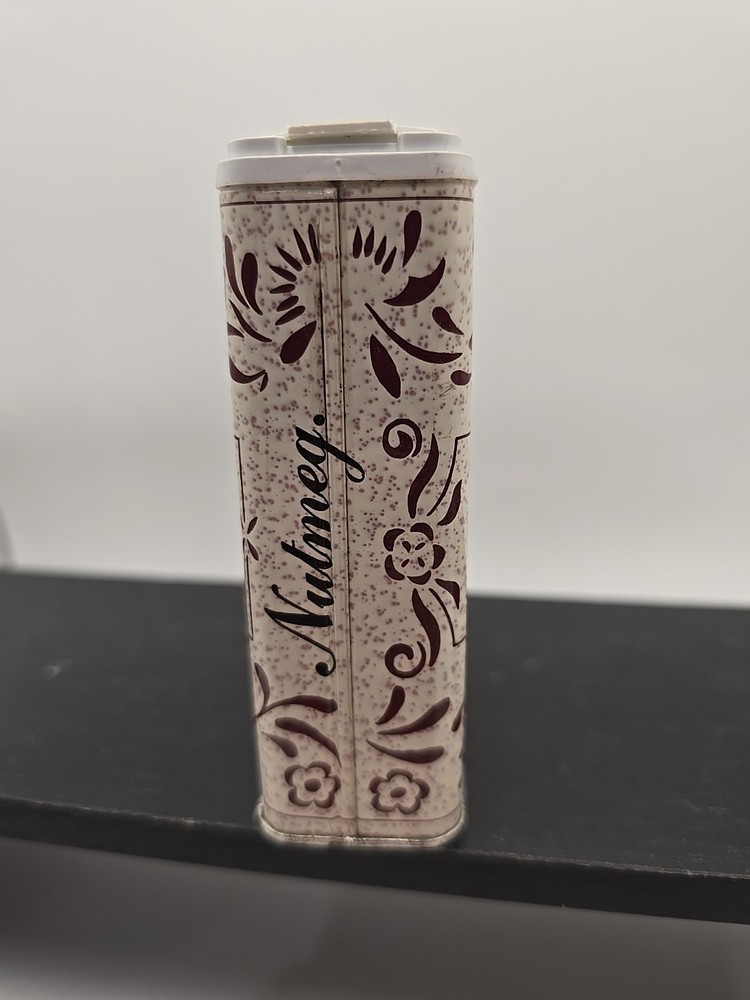 Vintage Rawleigh's Nutmeg 2.5 oz spice tin,