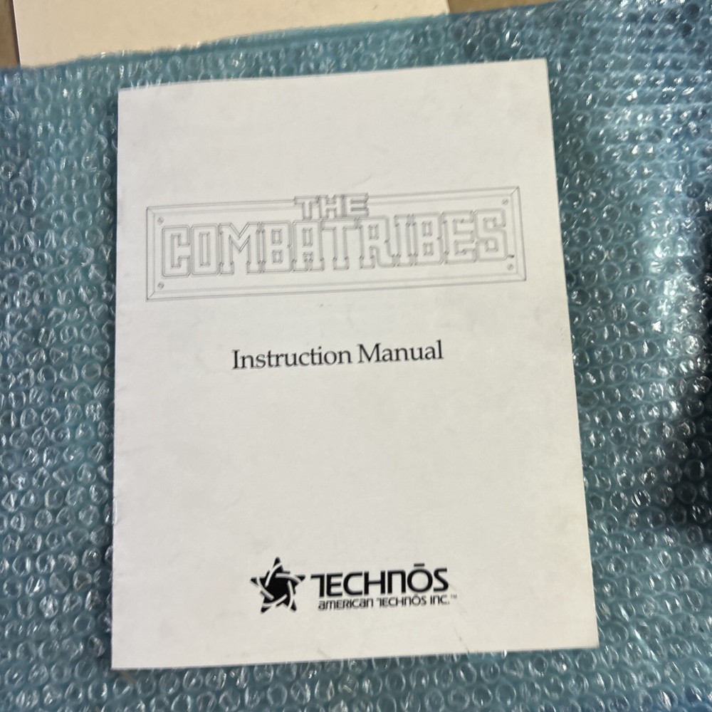 original THE COMBATRIBES Technos arcade video game manual