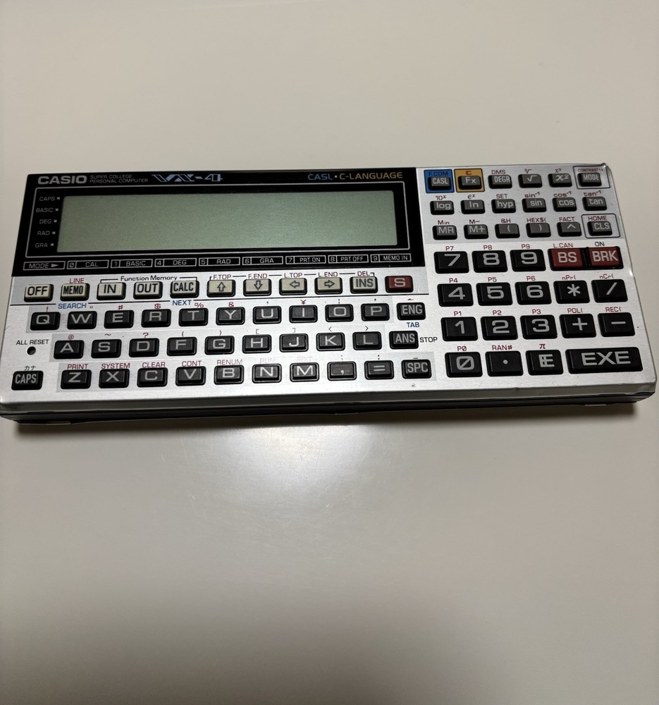 CASIO VX-4 mini Pocket Personal Computer Calculator Tested AA Battery Replaced.