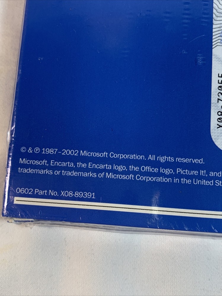 Microsoft Works Suite 2003 Set with Product Key. never used.