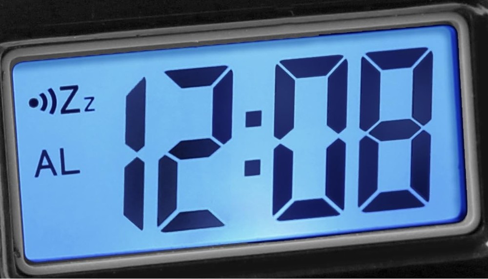 LCD Digital Bedside Alarm Clock with Blue Backlit Display and Snooze Function...