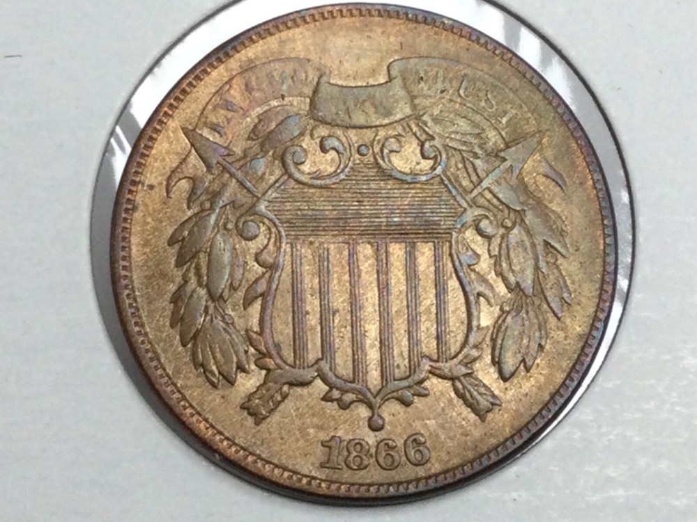 1866 Two Cent Piece in almost uncirculated