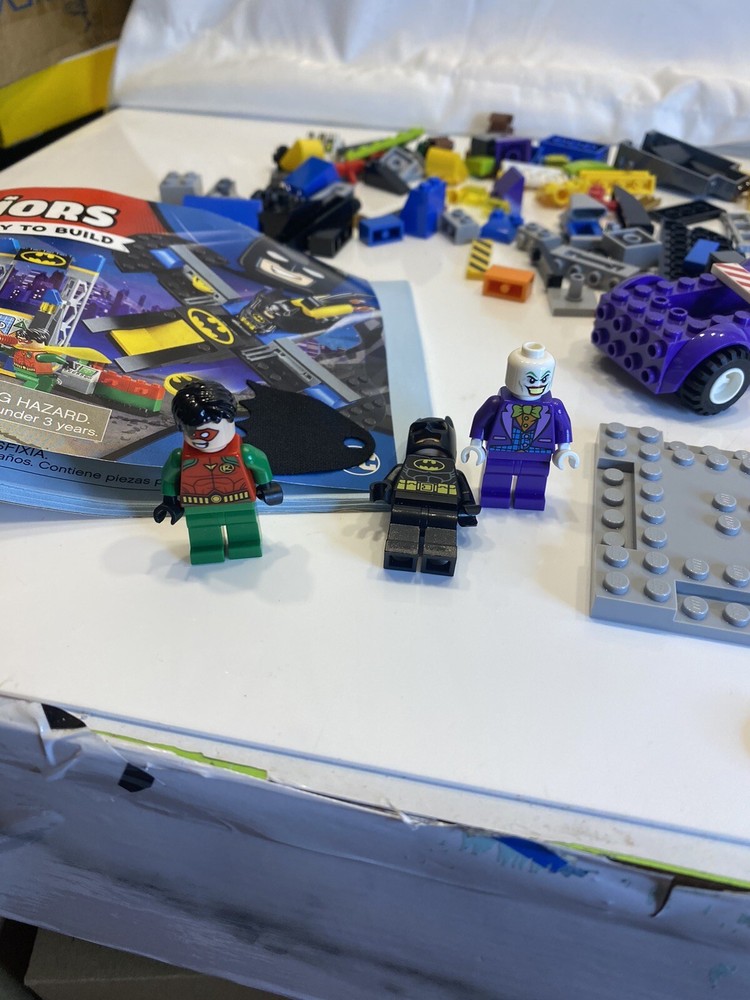 lego blocks and 3 figures with booklet