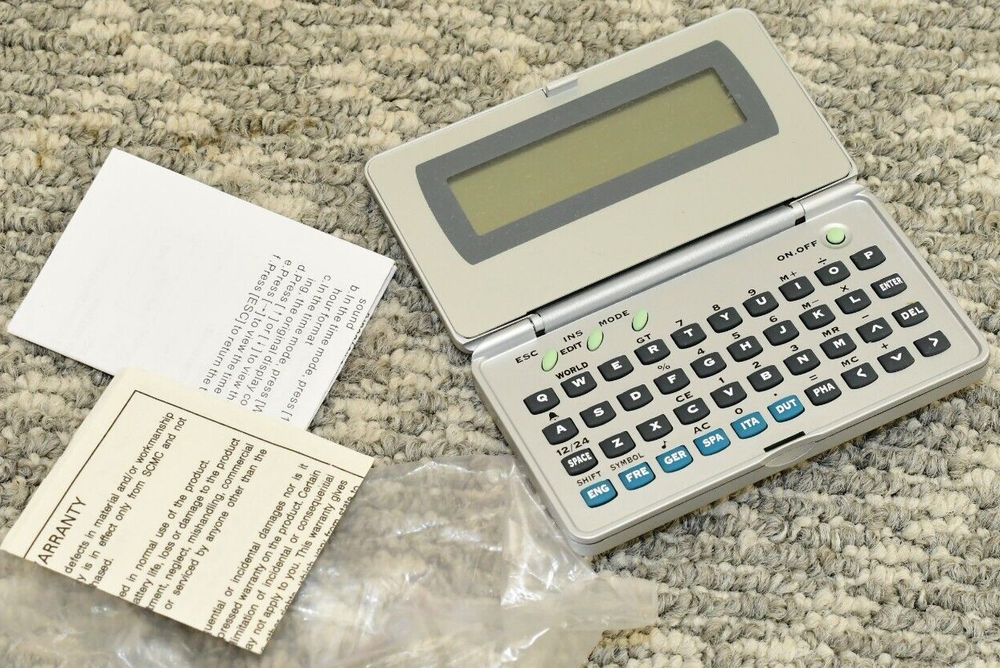 Generic Electronic Language Translator Handheld Computer - Needs New Batteries