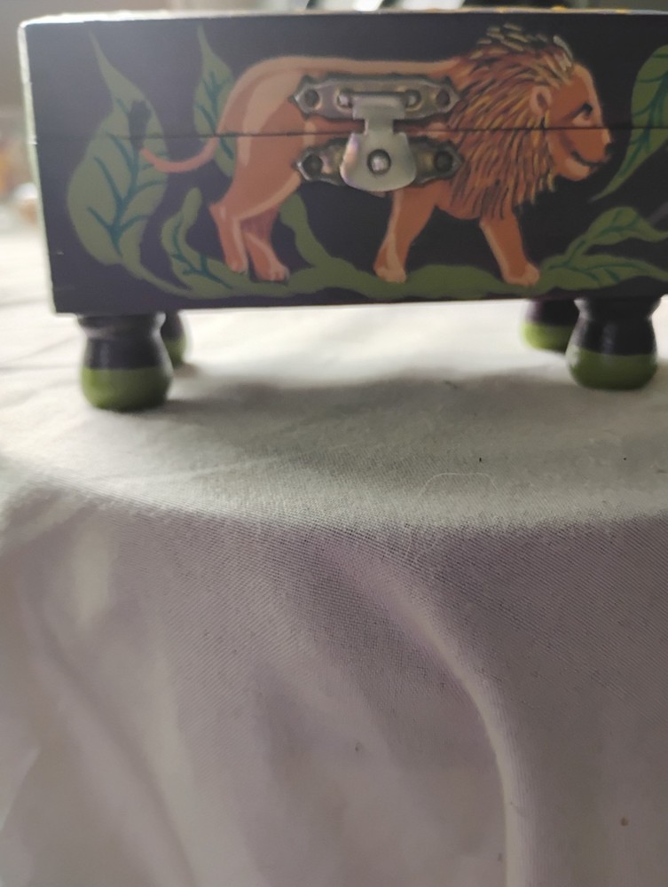 small painted box with tiger, elephant, zebra, lion, monkey