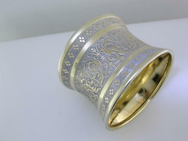 Decorative 800 Silver Napkin Ring w/ gold gilt finish & scroll patterns
