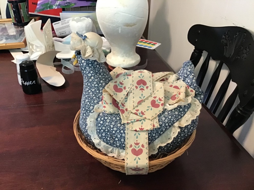 chicken pin cushion in a basket