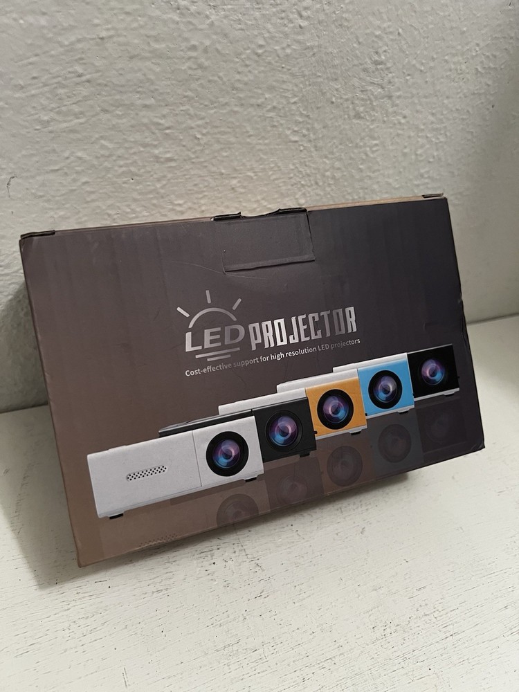 Portable White Multi-Media HD Mini LED Projector Model YG300