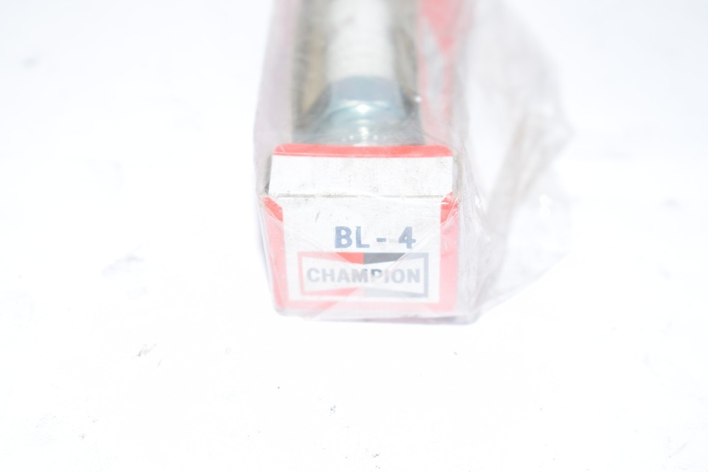 NEW Champion BL-4 Spark Plug