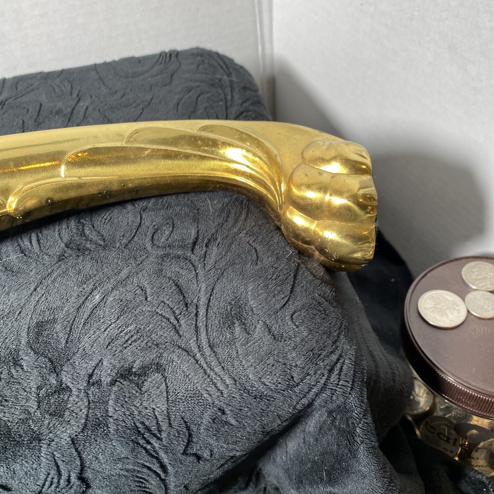 Brass colored claw table legs