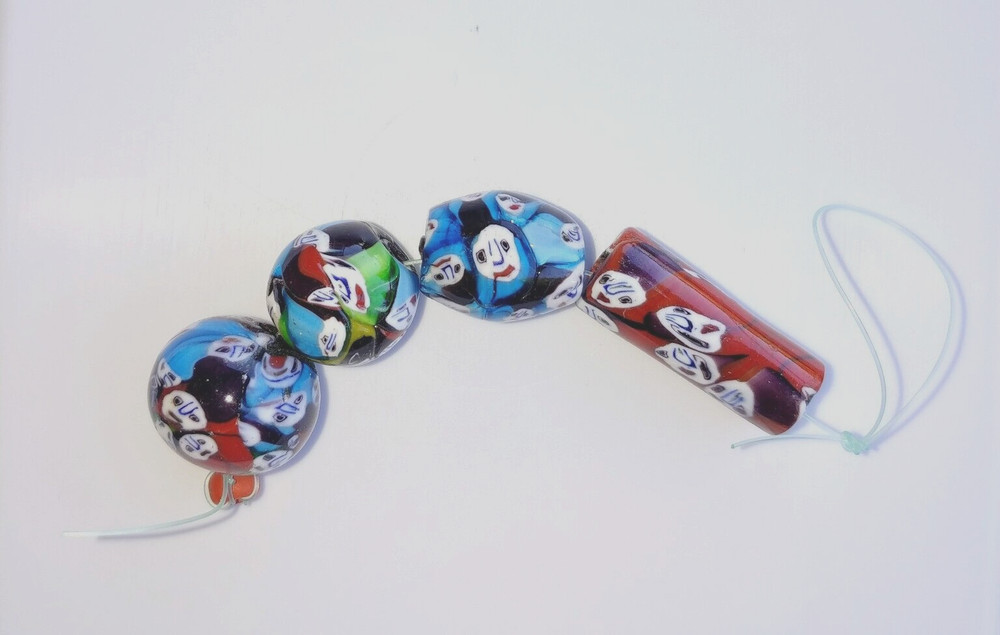 4 large Vintage African Face beads various sizes