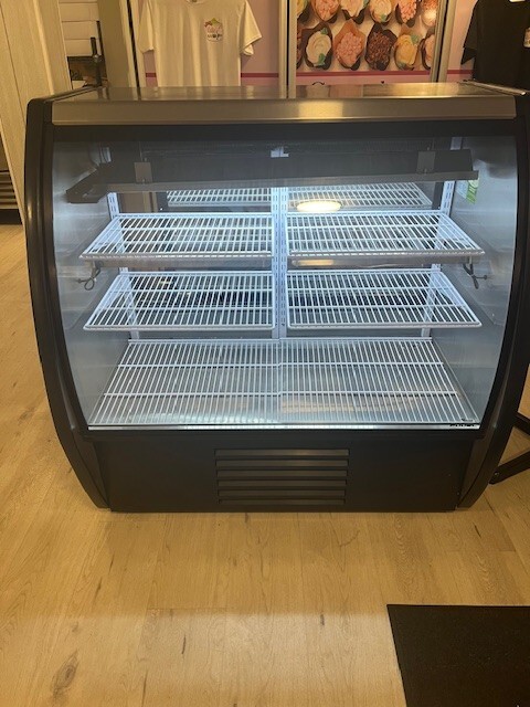 Fogel Mirage 48" refrigerated curved front display case with 3 level display