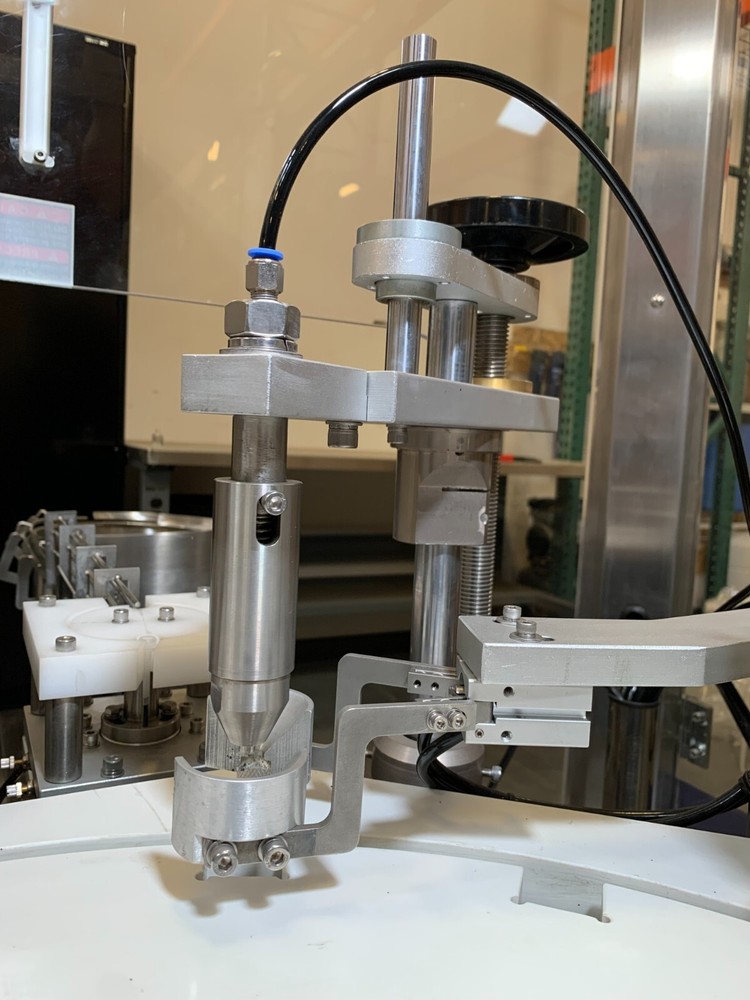 Automated Filling and Capping machine