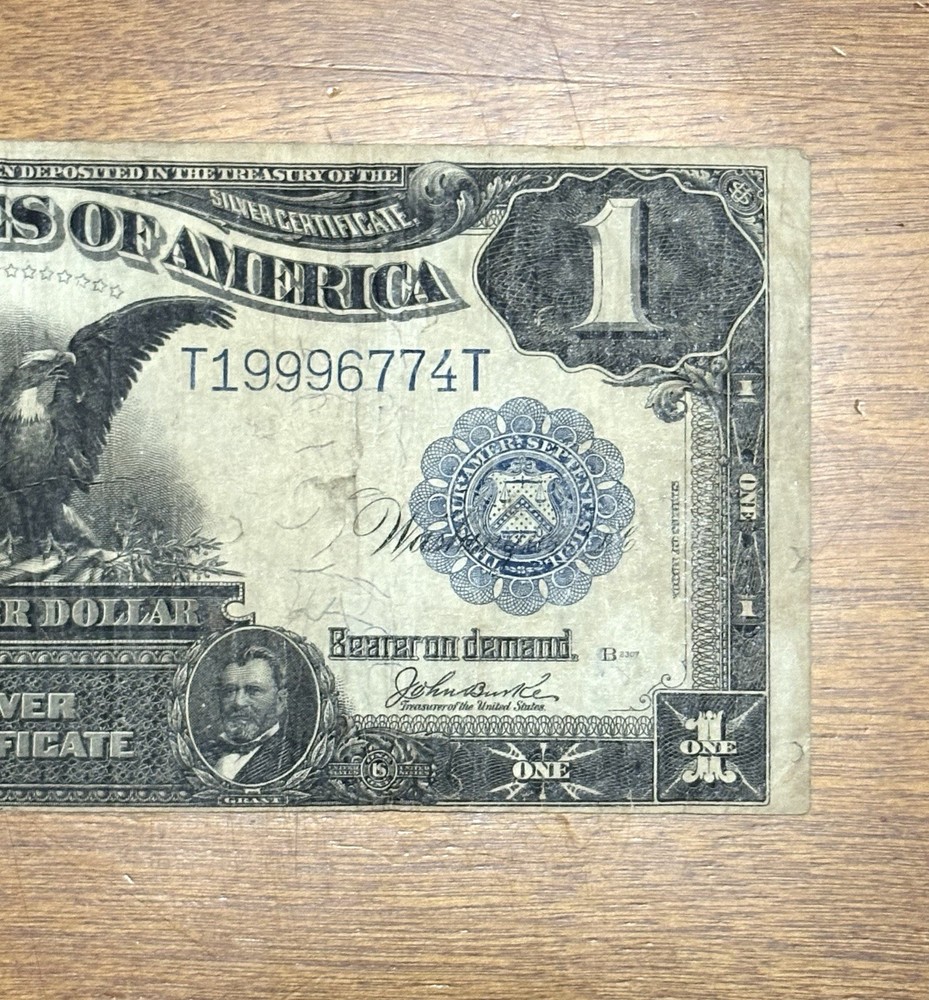 1899 $1 Large Size Black Eagle ( Triple 9’s)